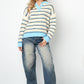 Knitted polo sweater with stripes